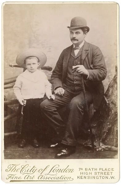 Victorian father and son in studio setting
