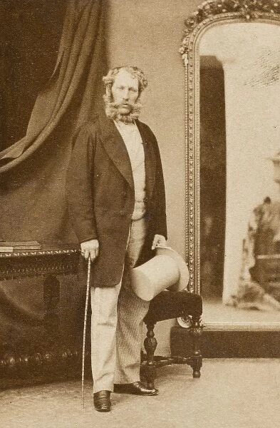 Victorian man standing by a mirror