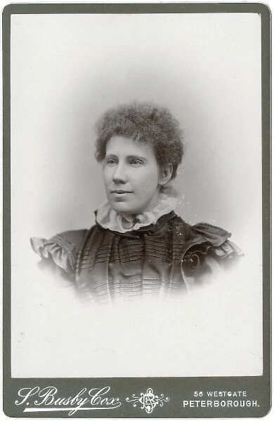 Vintage Black and White Portrait of Woman in High Collar Dress