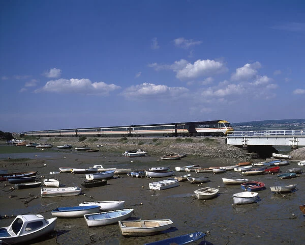 View of boats in the harbour, with train, Cockwood, Devon