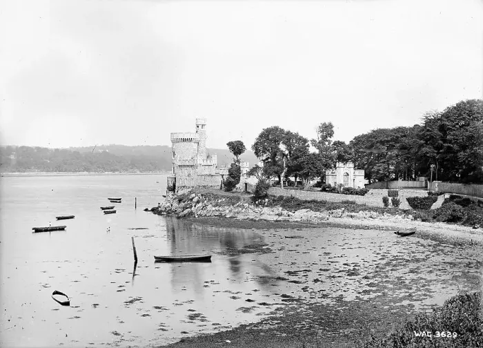 Framed Print : A side view of a Castle by the sea that appears to be Blackr Framed Print : A side view of a Castle by the sea that appears to be Blackr