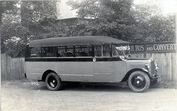 View of unidentified open-top bus