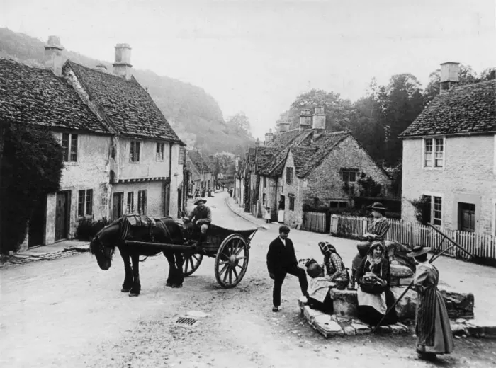 Framed Print : Village scene in Castle Combe, Wiltshire, 1890s Framed Print : Village scene in Castle Combe, Wiltshire, 1890s