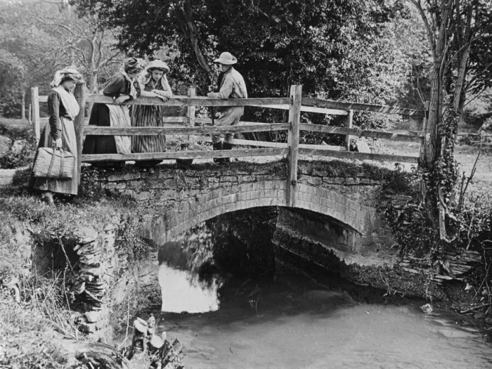 Framed Print : Villagers on a bridge over a stream, 1890s Framed Print : Villagers on a bridge over a stream, 1890s
