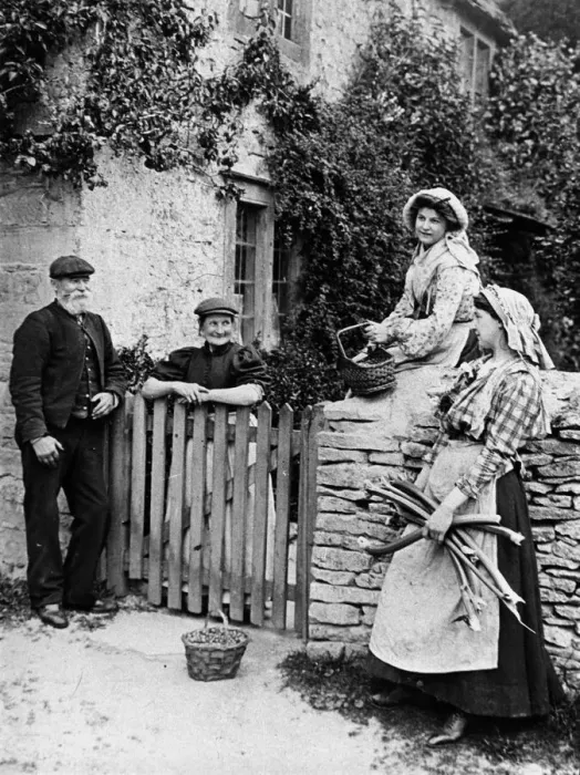 Framed Print : Villagers chatting over cottage gate, 1890s Framed Print : Villagers chatting over cottage gate, 1890s