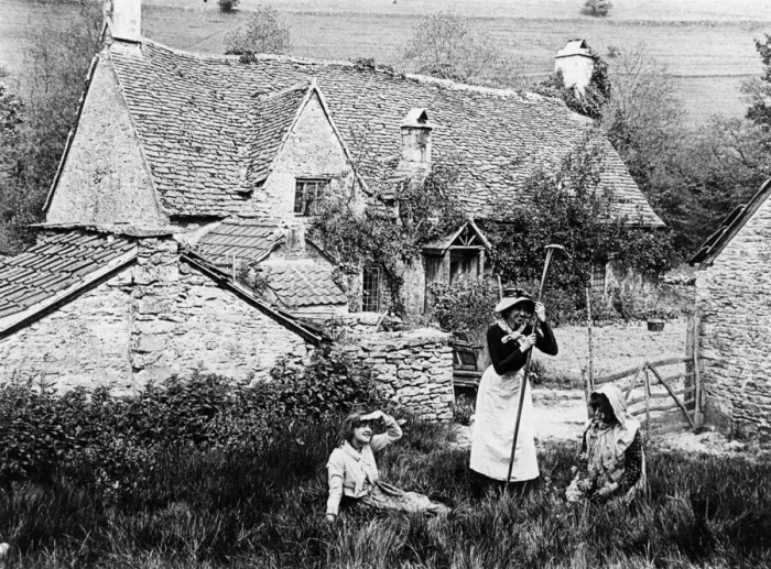 Framed Print : Villagers outside stone cottages, 1890s Framed Print : Villagers outside stone cottages, 1890s