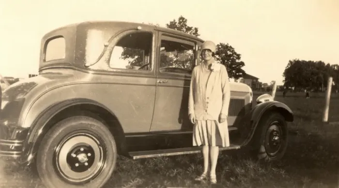 Framed Print : Vintage car and 1920s lady Framed Print : Vintage car and 1920s lady
