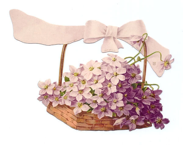 Violets in a basket on a cutout greetings card
