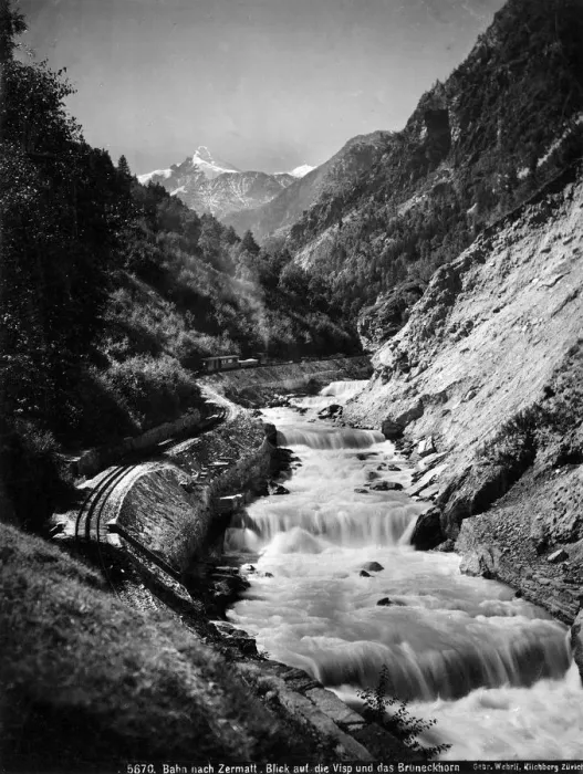 Framed Print : The Visp-Zermatt Railway Line by River Rhone, Switzerland Framed Print : The Visp-Zermatt Railway Line by River Rhone, Switzerland