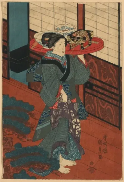 Framed Print : A waitress carrying a tray of food Framed Print : A waitress carrying a tray of food