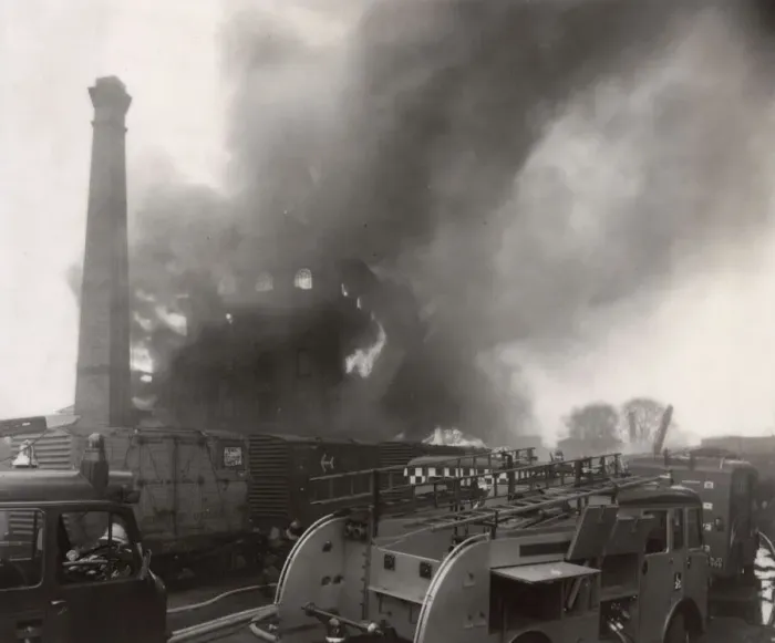 Framed Print : Warehouse on fire near railway line Framed Print : Warehouse on fire near railway line