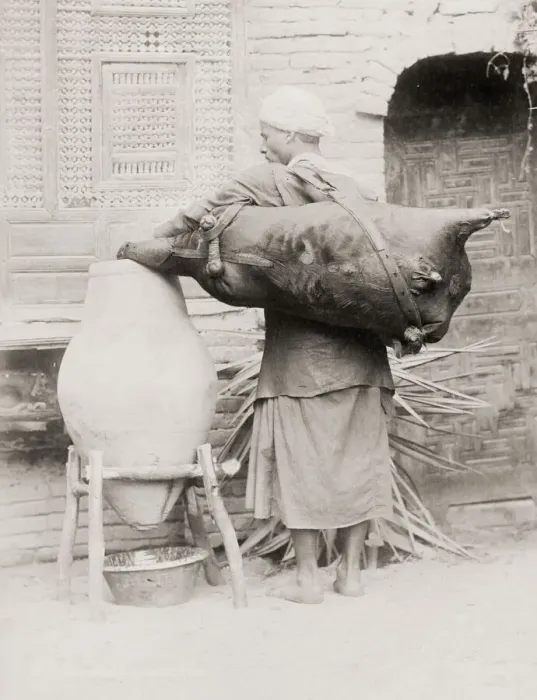 Framed Print : Water carrier with an animal skin container, Egypt Framed Print : Water carrier with an animal skin container, Egypt
