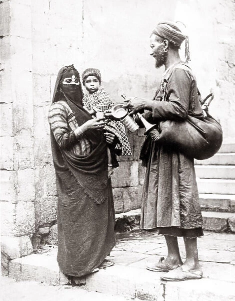 Water carrier, street vendor, Egypt, c. 1880 s