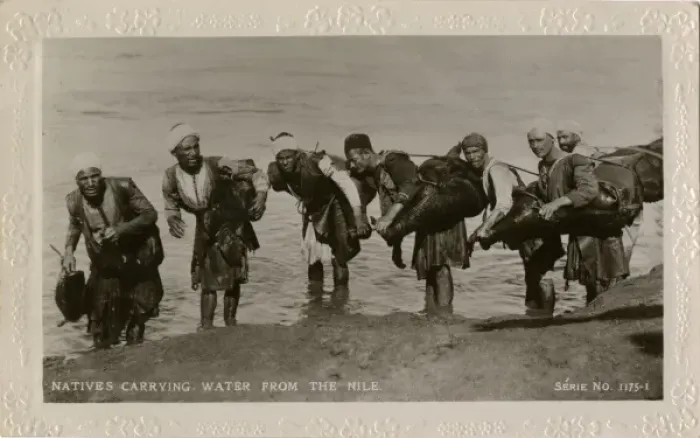 Framed Print : Water carriers with water from the Nile, Egypt Framed Print : Water carriers with water from the Nile, Egypt