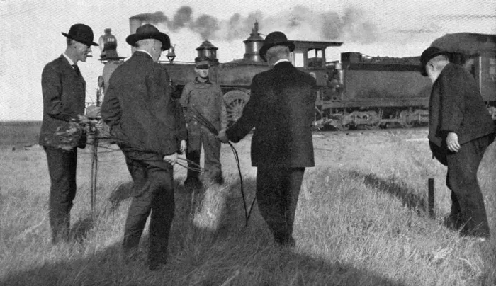Framed Print : Water dowser and steam train, 1907 Framed Print : Water dowser and steam train, 1907