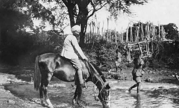 Watering horses, Lumi River, East Africa, WW1