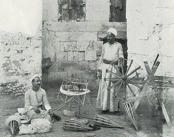 Weavers preparing silk for the looms, Cairo, Egypt