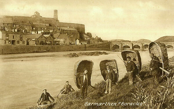 Welshmen carrying coracle boats, Carmarthen