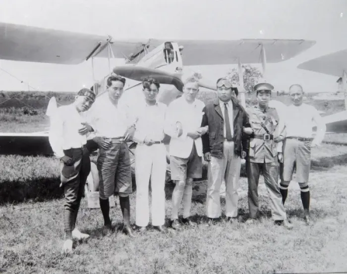 Framed Print : Western aviator on a trip to the Far East, with hosts Framed Print : Western aviator on a trip to the Far East, with hosts