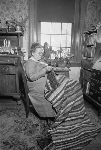 Westmoreland homesteader wearing dress of cloth woven hersel