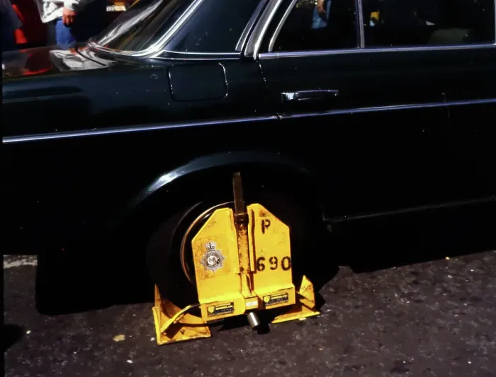 Framed Print : Wheel clamp, London in the 1980s Framed Print : Wheel clamp, London in the 1980s