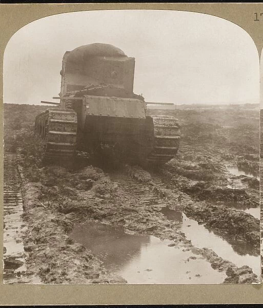 Whippet Tanks Ww1. British Whippet tanks ploughing through the mud- caked
