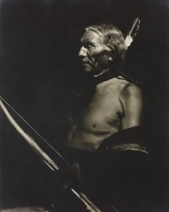 Framed Print : Whitehawk. Photograph shows portrait of Native American man with feather in hair Framed Print : Whitehawk. Photograph shows portrait of Native American man with feather in hair