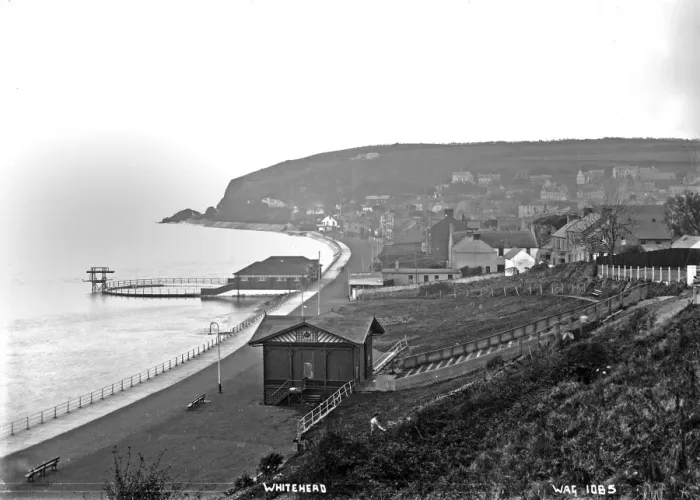 Framed Print : Whitehead - an elevated view of the town and promenade showing the swimming Framed Print : Whitehead - an elevated view of the town and promenade showing the swimming