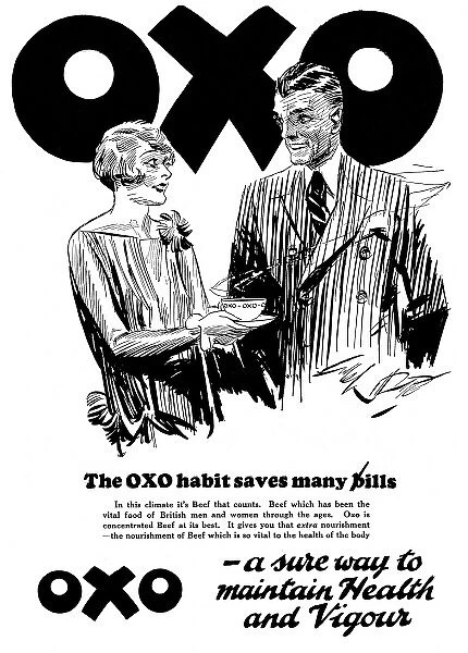 A wife giveing her husband a cup of Oxo