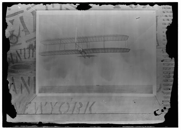 Wilbur Wright gliding from No. 2 Hill, west of the camp buil