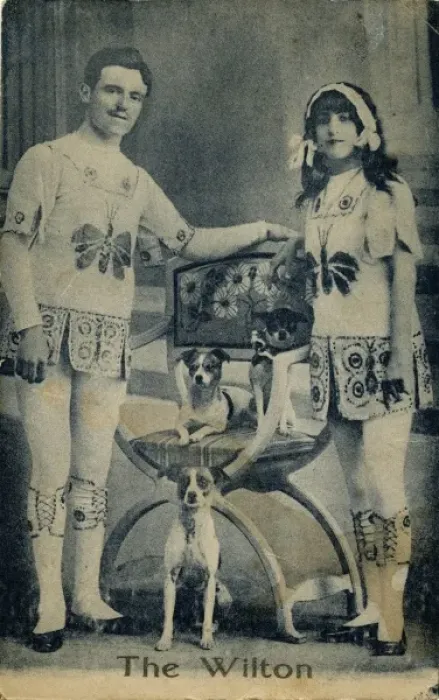 Framed Print : The Wilton -- couple with performing dogs Framed Print : The Wilton -- couple with performing dogs