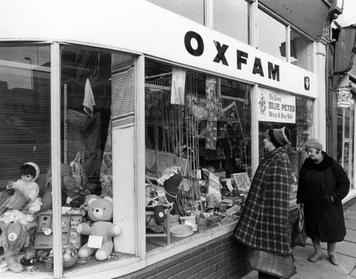 Framed Print : WINDOW SHOPPING / OXFAM Framed Print : WINDOW SHOPPING / OXFAM