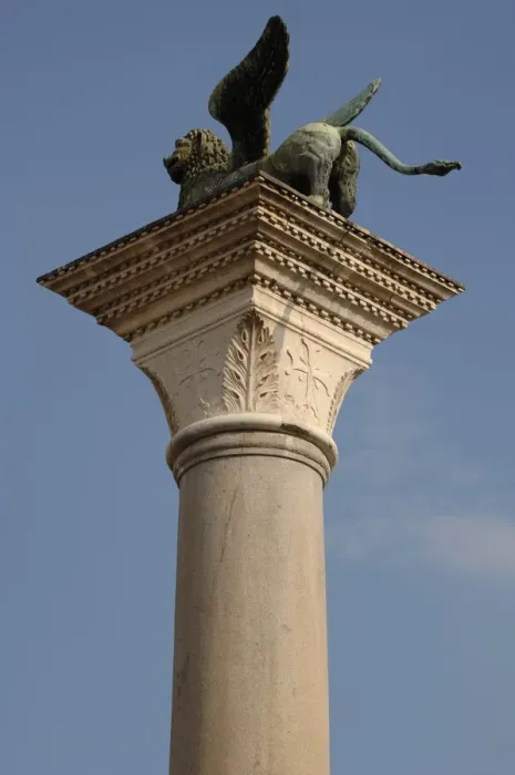 Framed Print : Winged lion statue of Saint Mark on a granite column in Framed Print : Winged lion statue of Saint Mark on a granite column in