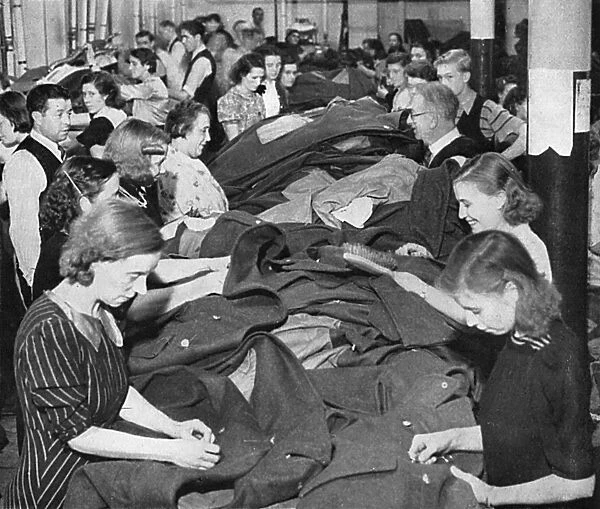 Winter greatcoats being made in army clothing factory, WWII