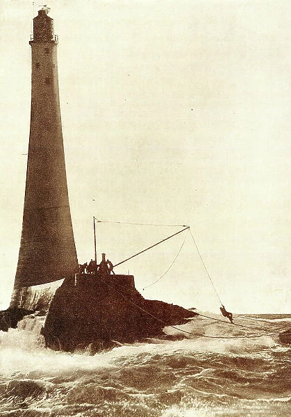 Wolf Rock Lighthouse hauling in the relief staff