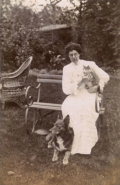 Woman with her cat and dog