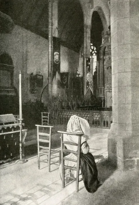Framed Print : Woman in a Catholic church, Brittany, Northern France Framed Print : Woman in a Catholic church, Brittany, Northern France