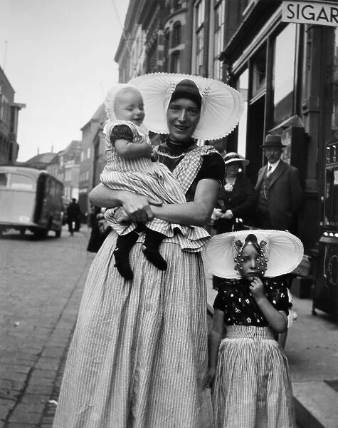 Woman and children in traditional dress, Holland