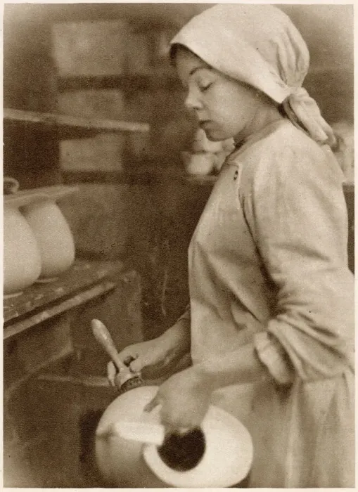 Framed Print : Woman at the cleaning stage of pottery-making. Date: 1913 Framed Print : Woman at the cleaning stage of pottery-making. Date: 1913