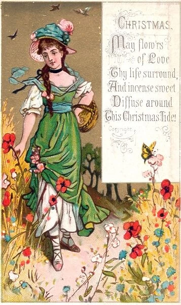 Woman in cornfield with poppies on a Christmas card