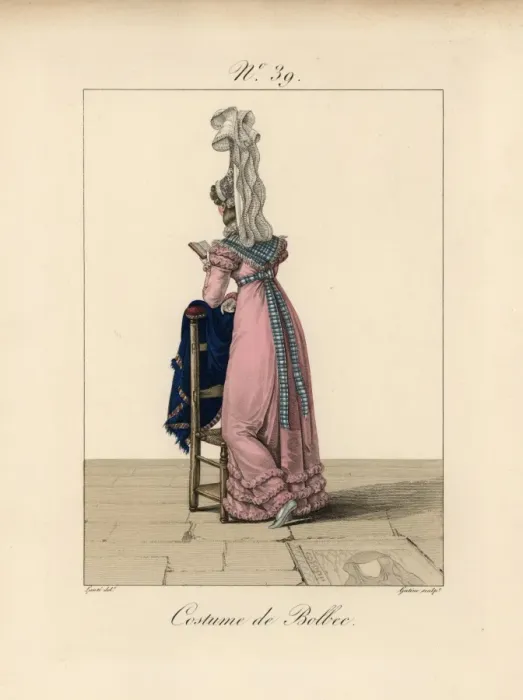 Framed Print : Woman in costume of Bolbec, reading a book Framed Print : Woman in costume of Bolbec, reading a book