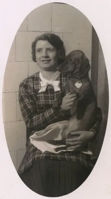 Framed Print : Woman with a dachshund on her lap Framed Print : Woman with a dachshund on her lap