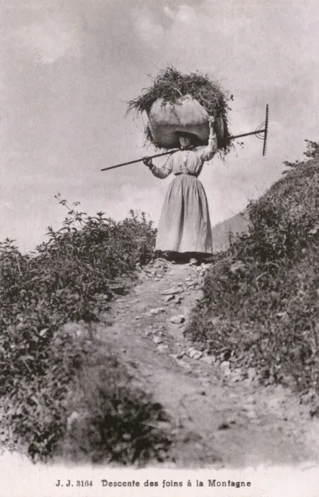 Framed Print : Woman descending a mountain path - Switzerland Framed Print : Woman descending a mountain path - Switzerland