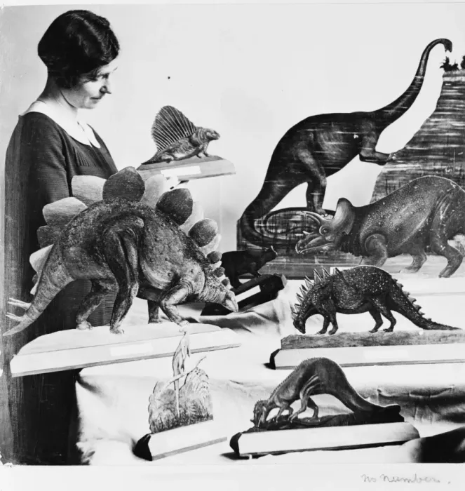 Framed Print : Woman with dinosaur models, 1926 Framed Print : Woman with dinosaur models, 1926