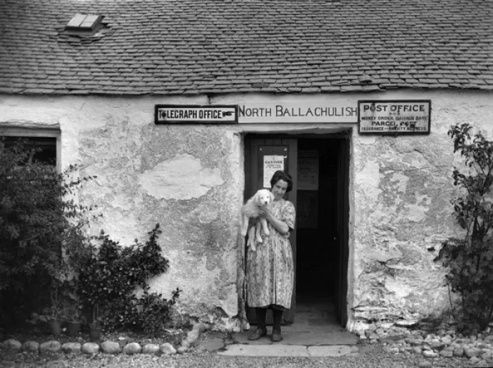 Framed Print : Woman and dog, North Ballachulish Post Office, Scotland Framed Print : Woman and dog, North Ballachulish Post Office, Scotland