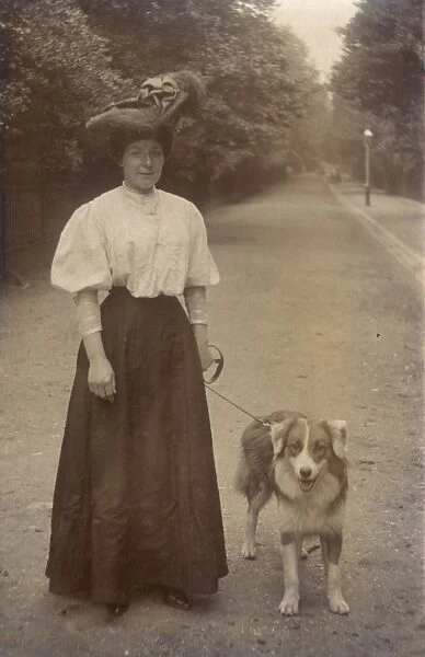 Woman with dog in a park