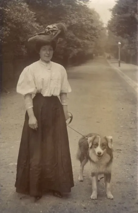 Framed Print : Woman with dog in a park Framed Print : Woman with dog in a park