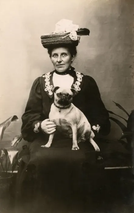Framed Print : Woman with dog in studio photo Framed Print : Woman with dog in studio photo