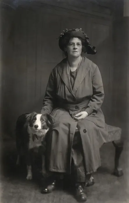Framed Print : Woman with dog in studio photo Framed Print : Woman with dog in studio photo
