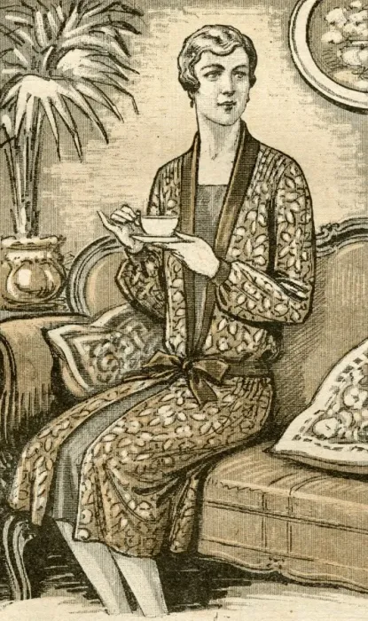 Framed Print : Woman Drinks Tea on Sofa Framed Print : Woman Drinks Tea on Sofa